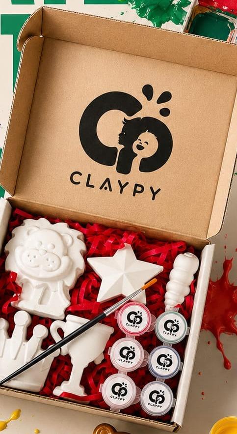 Claypy lion, crown, and star figurines with paints